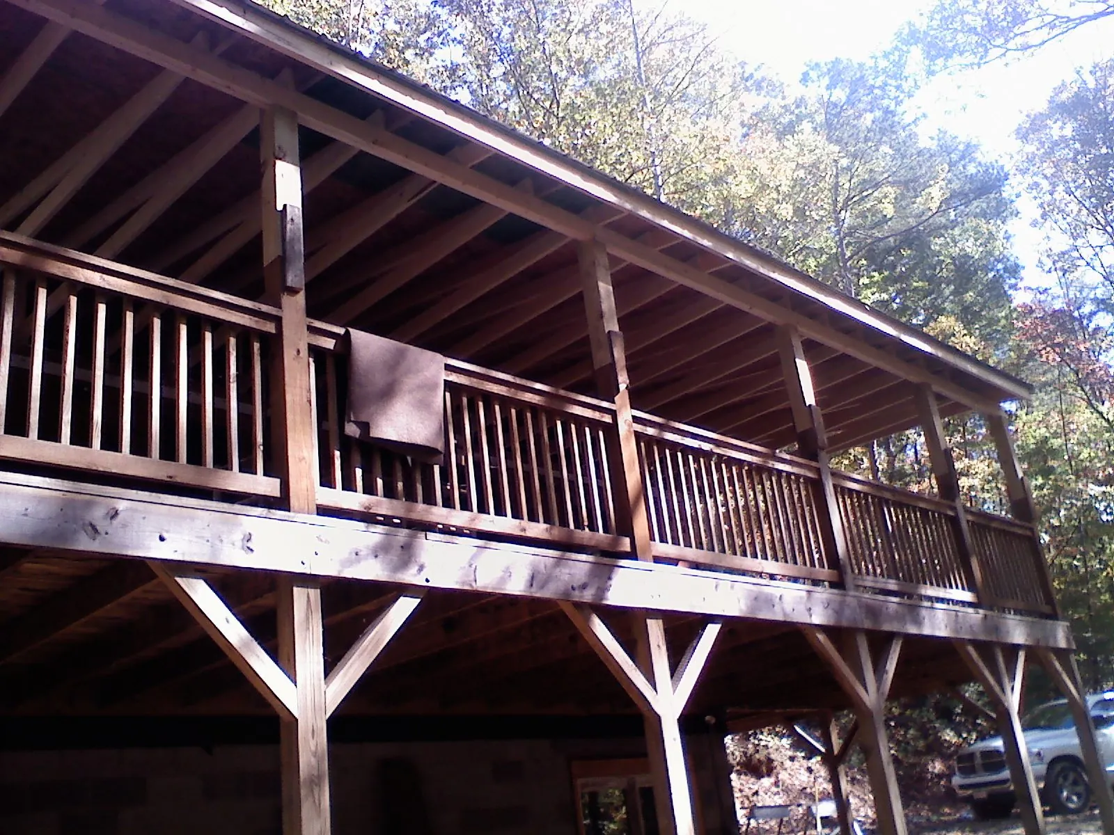 Timber framing under a new elevated porch and deck — Roof Leak Repair in Quantico by Roofing Brothers